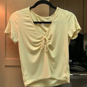 Yellow, V neckline, with tie, shortsleeved shirt